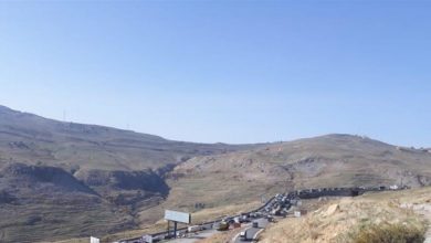 Photo of الجيش يوزع الكمامات على طريق ضهر البيدر وزحمة سير خانقة