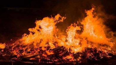 Photo of حريق كبير يلامس المنازل في مزبود
